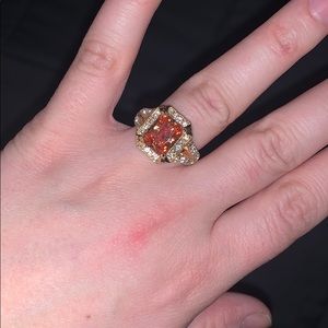 Size 6.5 brand new ring. Gold and orange